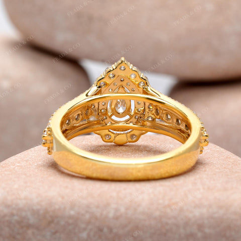 1.251 CT Pear, Round Cut Colorless Engagement Ring