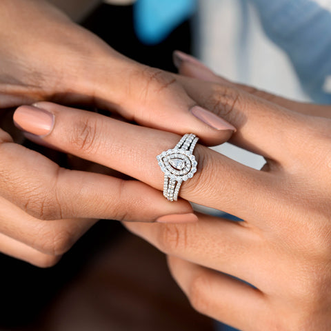 1.251 CT Pear, Round Cut Colorless Engagement Ring