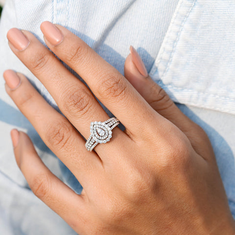 1.251 CT Pear, Round Cut Colorless Engagement Ring