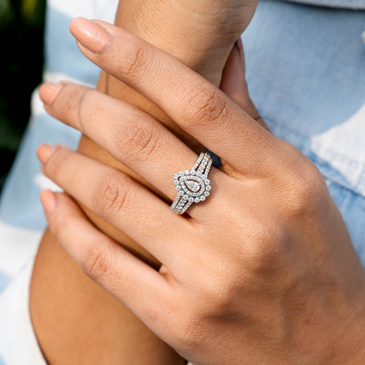 1.251 CT Pear, Round Cut Colorless Engagement Ring