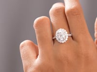 3.392 CT Round, Oval Cut Colorless Engagement Ring