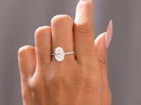 3.188 CT Round, Oval Cut Colorless Engagement Ring