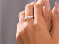 1.24 CT Round, Oval Cut Colorless Engagement Ring