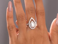 2.25 CT Pear, Round Cut Colorless Engagement Ring