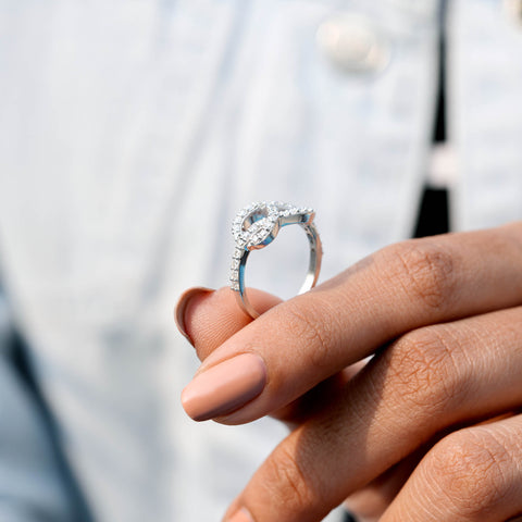 0.59 CT Round Cut Colorless Engagement Ring