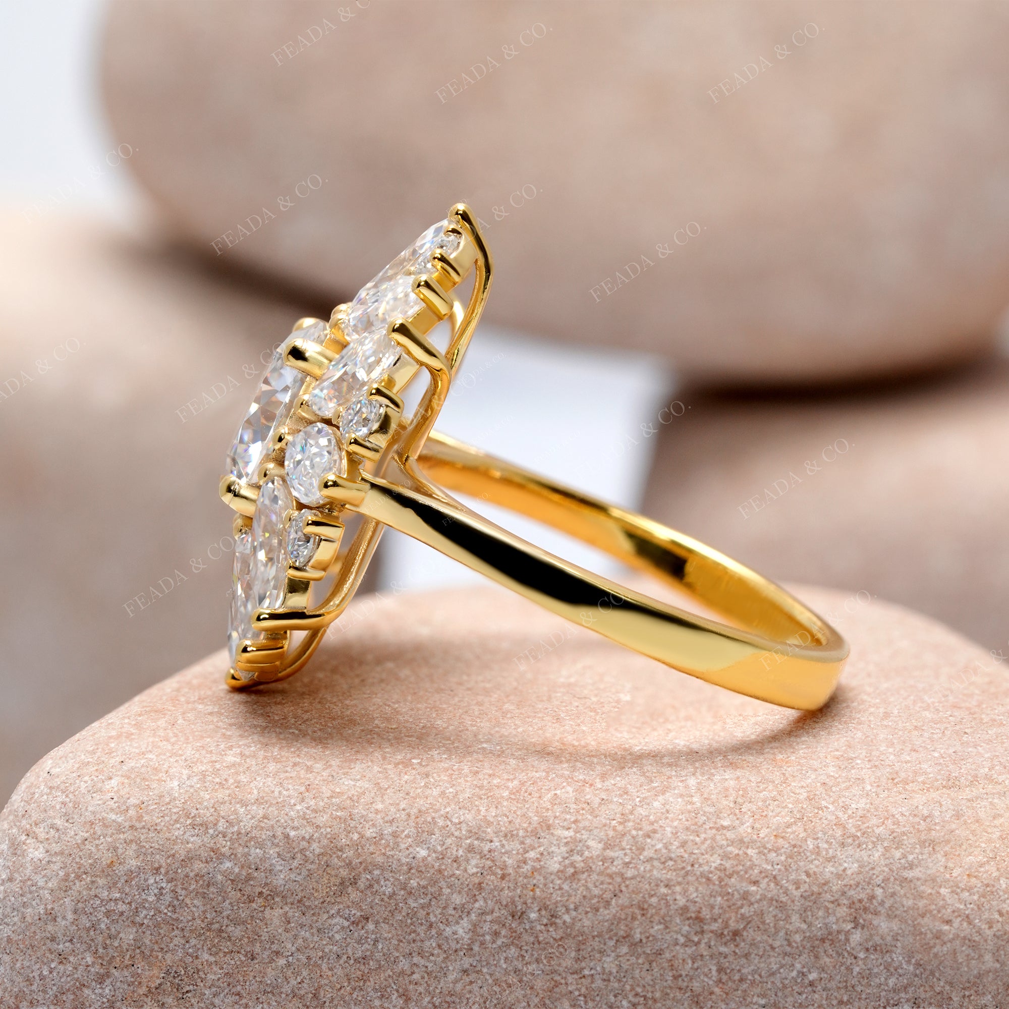 Gold ring with diamonds on a stone surface
