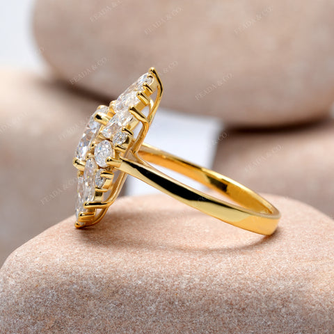 Gold ring with diamonds on a stone surface